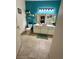 Cozy bathroom with a white vanity, vessel sink, shelving, and tile flooring at 3400 Cabana Dr # 1061, Las Vegas, NV 89122