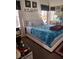 This bedroom has a plush queen bed with decorative headboard and mirrored closet at 3400 Cabana Dr # 1061, Las Vegas, NV 89122