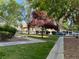 This property features beautiful landscaping with mature trees and covered parking areas at 3400 Cabana Dr # 1061, Las Vegas, NV 89122