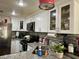 Bright kitchen with granite countertops, stainless steel appliances, and white cabinets at 3400 Cabana Dr # 1061, Las Vegas, NV 89122