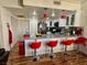 Kitchen featuring granite counters, modern appliances, and breakfast bar at 3400 Cabana Dr # 1061, Las Vegas, NV 89122