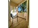 Outdoor patio with view of mature trees, blue skies and decorative chair at 3400 Cabana Dr # 1061, Las Vegas, NV 89122