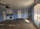 Spacious garage equipped with a washer, dryer, water heater, and storage cabinets at 4128 Annie Oakley Dr, Las Vegas, NV 89121