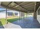 Covered patio, lush lawn, and stylish fencing create a private outdoor retreat at 4347 S Mojave Rd, Las Vegas, NV 89121