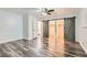 Spacious bedroom with ceiling fan and barn door closets at 4347 S Mojave Rd, Las Vegas, NV 89121