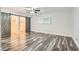 Spacious bedroom with wood floors and a large closet with sliding barn doors and built in storage at 4347 S Mojave Rd, Las Vegas, NV 89121