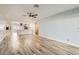 Bright open-concept living room flowing into a kitchen area with stainless steel appliances at 4347 S Mojave Rd, Las Vegas, NV 89121