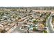 Neighborhood aerial view featuring homes with solar panels and private pools at 4394 El Campana Way, Las Vegas, NV 89121