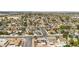 Extensive neighborhood with lush trees, solar panels, and scenic views at 4394 El Campana Way, Las Vegas, NV 89121
