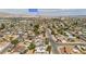 An aerial view shows a charming residential neighborhood, highlighting the house, its solar panels and nearby Sam's Town Hotel at 4394 El Campana Way, Las Vegas, NV 89121