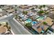 Aerial shot of homes with pools and solar panels in a planned community at 4394 El Campana Way, Las Vegas, NV 89121