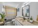 Bright bathroom with modern mirror, decor and shower with patterned curtain at 4394 El Campana Way, Las Vegas, NV 89121