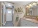 Stylish bathroom featuring a modern vanity, glass-enclosed shower, and elegant fixtures at 4394 El Campana Way, Las Vegas, NV 89121