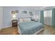 Serene bedroom featuring soft lighting, a comfortable bed, and stylish decor at 4394 El Campana Way, Las Vegas, NV 89121