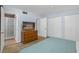 Cozy bedroom featuring a queen bed, closet and an en-suite bathroom at 4394 El Campana Way, Las Vegas, NV 89121