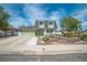 Charming two-story home with a well-maintained lawn and a spacious driveway leading to an attached garage at 4394 El Campana Way, Las Vegas, NV 89121