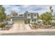 Charming two-story home featuring a well-maintained yard and attached two car garage at 4394 El Campana Way, Las Vegas, NV 89121