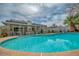 Inviting pool area showcasing a pristine pool and serene backyard setting, perfect for relaxation at 4394 El Campana Way, Las Vegas, NV 89121