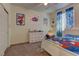 bedroom featuring a bed, closet, and colorful decor at 5629 Portage Lake Ct, Las Vegas, NV 89130
