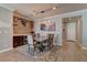 Elegant dining room featuring modern lighting, stylish decor, and wood-look floors at 5629 Portage Lake Ct, Las Vegas, NV 89130