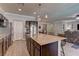 Bright open kitchen featuring a large island, stainless appliances, and eat-in dining at 5629 Portage Lake Ct, Las Vegas, NV 89130