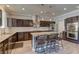 Beautiful kitchen with granite countertops, stainless steel appliances, and a center island at 5629 Portage Lake Ct, Las Vegas, NV 89130