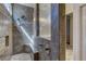 Modern tiled shower with rainfall showerhead and built-in bench at 5629 Portage Lake Ct, Las Vegas, NV 89130