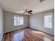 Bright bedroom featuring hardwood floors at 5664 Dawn Falls St, Las Vegas, NV 89148