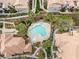 Aerial view of a community pool and landscaped grounds at 5855 Valley Dr # 1080, North Las Vegas, NV 89031