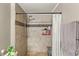 Bathroom with a tiled shower, upgraded shower head, and a built-in seat at 5855 Valley Dr # 1080, North Las Vegas, NV 89031