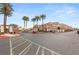 Gated community showcasing lush tropical landscaping and well-maintained building exteriors at 5855 Valley Dr # 1080, North Las Vegas, NV 89031