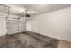 A two car garage featuring a garage door opener at 5855 Valley Dr # 1080, North Las Vegas, NV 89031