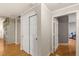 Hallway featuring wood flooring and closet space at 5855 Valley Dr # 1080, North Las Vegas, NV 89031