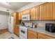 Well-lit kitchen featuring essential appliances and ample cabinet space at 5855 Valley Dr # 1080, North Las Vegas, NV 89031