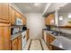 Kitchen featuring stainless appliances, granite counters, and custom tile flooring at 5855 Valley Dr # 1080, North Las Vegas, NV 89031