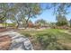 Community park featuring lush green space and a walkway for residents at 6153 Sea Cliff Cove St, North Las Vegas, NV 89031