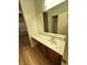 Bathroom vanity with marble-look countertop and ample storage space at 6475 Benbrook Springs Dr, Las Vegas, NV 89131