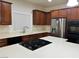Kitchen featuring stainless steel appliances, white countertops, and a gas cooktop at 6475 Benbrook Springs Dr, Las Vegas, NV 89131