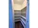 Walk-in pantry with plenty of storage shelving at 6475 Benbrook Springs Dr, Las Vegas, NV 89131