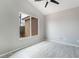 Bedroom with vaulted ceiling, neutral paint and light wood floors at 6654 Coronado Crest Ave, Las Vegas, NV 89139