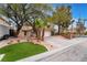 Beautiful single-story home with mature trees and landscaped front yard at 6654 Coronado Crest Ave, Las Vegas, NV 89139