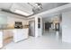 Bright kitchen with stainless steel appliances, an island, and seamless access to other living areas at 6654 Coronado Crest Ave, Las Vegas, NV 89139