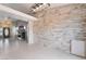 Open floorplan showcasing living area with modern fireplace feature and decorative wooden wall at 6654 Coronado Crest Ave, Las Vegas, NV 89139