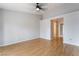 Spacious living room features wood floors and neutral paint at 6654 Coronado Crest Ave, Las Vegas, NV 89139