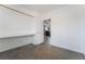 Bright room with neutral paint, desk and shelf space with an attached closet at 6654 Coronado Crest Ave, Las Vegas, NV 89139