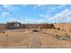Large, well-maintained backyard with firepit and outdoor seating, ideal for relaxation and gatherings at 7115 Calvert Cliffs St, North Las Vegas, NV 89084