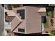 Aerial view of home's roof showing solar panels, patio area and putting green at 7386 Campbell Ranch Ave, Las Vegas, NV 89179