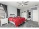 Comfortable bedroom with neutral tones, soft lighting, and walk-in closet at 7386 Campbell Ranch Ave, Las Vegas, NV 89179