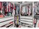 Organized walk-in closet with shelving, hanging rods, and shoe racks for optimal storage at 7386 Campbell Ranch Ave, Las Vegas, NV 89179