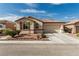 Charming single-story home with a desert-landscaped front yard, tile roof, and two-car garage at 7386 Campbell Ranch Ave, Las Vegas, NV 89179